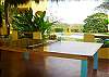 This custome made wooden pin-pong table is under the palm thatched palapa (gazebo) at Casa Exotica vacation rental in Esterillos, Costa Rica, near Manuel Antonio and Jaco.