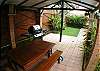 Pool area and gazebo with gas grill at Casa Miguel vacation rental house in Jaco beach
