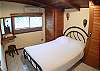 Bedroom 6 (upstairs) has a Double (Full) bed and closet, at Casa Miguel vacation rental house in Jaco, Costa Rica, 8 minutes walking distance to the beach and downtown.