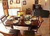 Dining table for 6 guests next to the living area at our Mar Arena vacation rental condo in Jaco, Costa Rica.