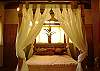 This room has a beautiful Queen canopy bed and a closet at sonidos del Rio, Vacation Rental, Jaco Costa Rica.