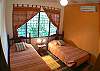 Guesthouse bedroom 2 with Twin beds and air conditioning is available as an add-on option and is NOT INCLUDED in pricing quoted here.  Please ask for guesthouse pricing.