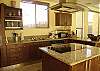 This is the elegant fully equipped kitchen  at Casa La Ostra vacation rental house in the exclusive Hermosa Palms beachfront gated community, Playa Hermosa, Costa Rica