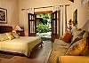 Second guest house with Queen bed and ensuite bathroom at Casa Milagro beachfront vacation rental villa in Jaco, Costa Rica
