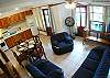Living area with comfortable sofas, AC, TV, dining table for four, large kitchen area. Rio Copey 2 vacation rental in Jaco.