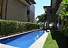 Pool area with terrace including charcoal BBQ, lounge chairs and table at Casa Colonial vacation rental home at Hermosa Palms in Playa Hermosa, Puntarenas