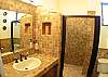 Ensuite bathroom with shower in Bedroom 3 at Hermosa Palms Villa La Costa luxury vacation rental in Playa Hermosa, Costa Rica.
