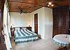 Casita 2 with Double bed, closet and bathroom with shower at Villa Jaco Sol vacation rental in Jaco, walking distance to the beach and downtown