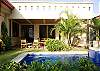 Pool area and terrace at Hermosa Palms Villa La Costa luxury vacation rental in Playa Hermosa, Costa Rica.