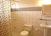 Bathroom with shower in Apartment 2 at Casa Gris vacation rental home in Jaco, walking distance to the beach and center.