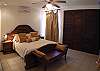 Bedroom 2 with Queen bed and closet at Hermosa Palms Casa McDermott ocean view vacation rental house in Hermosa beach, near Jaco, Costa Rica