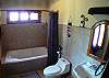 Master bathroom with tub at Quinta Teca vacation rental house at Opera Salvaje Playa Hermosa de Jaco