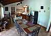 Kitchen and dining table at Quinta Teca vacation rental house at Opera Salvaje Playa Hermosa de Jaco
