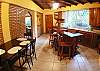 Well equipped kitchen with breakfast bar and table for four (fridge is inside pantry to the right, no oven) at Casa Miguel vacation rental in Jaco, 8 minutes walking distance to beach and main street.
