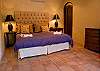 Bedroom 3 (second floor) with King bed, walk-in closet and ensuite bathroom, at Villa Antigua luxury vacation rental home in south Jaco beach, Costa Rica