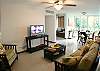 Dining table and living area at Costa Linda condomimium vacation rental in Jaco walking distance to the beach.