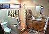 Second bathroom with shower and granite counter top at Casa Colonial at Hermosa Palms gated community in Playa Hermosa, Costa Rica