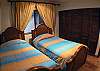 Third bedroom with Twin beds, black-out curtains and ample closet at Casa Colonial at Hermosa Palms gated community in Playa Hermosa, Costa Rica