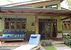 This is the terrace with a beautiful view of the pool and gardens at Sonidos del Rio, Vacation Rental, Jaco Costa Rica wich is just a few steps from the beach.
