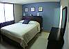 Master Bedroom-Queen with closet, chest of drawers and bathrrom at Costa Linda 3-20 vacation rental condominium Jaco Costa Rica
