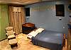 Upstairs Second Bedroom with Double sized Futon, ensuite bathroom and closet at Casa Tortuga vacation rental house at Hermosa Palms in Playa Hermosa, Puntarenas, Costa Rica
