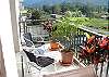 Balcony with chairs at Jaco Bay 4701 vacation rental condominiums in Jacobeach