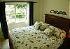 Bedroom 2 with Queen bed and closet, black-out curtains, at Del Mar 5N vacation rental condo at Los Suenos Resort & Marina, Playa Herradura, Costa Rica