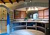 Master bathroom with double sink and walk-in shower at Casa Milagro beachfront vacation rental villa in Jaco, Costa Rica