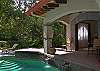 Pool, gardens and Bedroom 2 at Villa Antigua luxury vacation rental home in south Jaco beach, Costa Rica