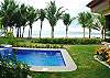 Pool and children's pool overlooking the beach at Hermosa Palms Villa La Costa luxury vacation rental in Playa Hermosa, Costa Rica.