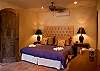 Bedroom 3 (second floor) with King bed, walk-in closet and ensuite bathroom, at Villa Antigua luxury vacation rental home in south Jaco beach, Costa Rica