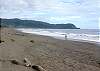 Jaco beach looking south from outside La Flor beachfront gated community on the North side of Jaco beach Costa Rica