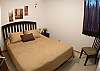 Second Bedroom with Double bed and closet at Costa Linda vacation rental condominiums in Jaco, walking distance to the beach.