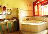 Bathroom 2 with jetted bathtub and shower within Guest Suite at Casa Exotica vacation rental home in Esterillos, Costa Rica