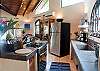 Kitchen at the main house at Casa Milagro beachfront vacation rental villa in Jaco, Costa Rica