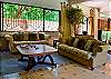 Living room with comfortable sofas, 40 inch TV and DVD player at Villa Antigua luxury vacation rental home in south Jaco beach, Costa Rica