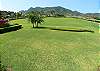 View of private yard and golf course at Los Suenos Del Mar 5N vacation rental luxury condominium in Playa Herradura, Costa Rica