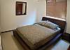 Master Bedroom with Queen bed and closet at Costa Linda condominium vacation rental in Jaco, walking distance to beach.
