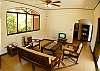 Sitting area with TV at VillaLas Monas vacation rental house near Jaco, Costa Rica