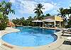 Pool, Whirpool, BBQ area, sun deck and a beautiful view of the beach at La Flor beachfront gated community on the North side of Jaco beach Costa Rica