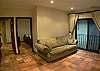 Living area with sofabed with Double size mattress (sleeps 2), and 50 inch TV on second floor at Casa Colonial at Hermosa Palms gated community in Playa Hermosa, Costa Rica