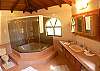 Master Bathroom with jetted bathtub at Casa de Somers beachfront vacation rental in Esterillos, near Manuel Antonio and Jaco.