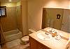 Master Bathroom with combination shower and bathtub, at Del Mar 5N vacation rental condo at Los Suenos Resort & Marina, Playa Herradura, Costa Rica