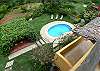 View from roof top Terrace where you can see the pool, gazebo and the volleyball court, at Casa Exotica vacation rental home in Esterillos, Costa Rica, near Manuel Antonio and Jaco