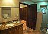 Master Bathroom with granite counter top and shower at Casa Colonial at Hermosa Palms gated community in Playa Hermosa, Costa Rica