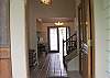 Generous tiled entry welcomes you into the home.