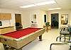 Downstairs pool/game room off den