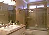 Crisp and clean.  located in the hall next to bedrooms 2 and 3.