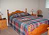 nicely decorate with a queen size bed.