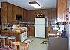 This kitchen is open to the dining and living room.